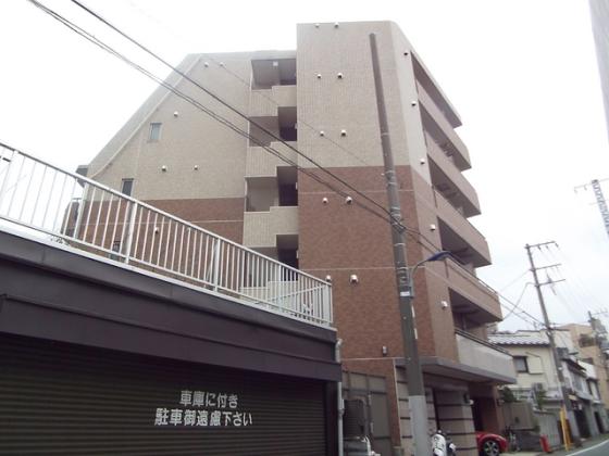 オシャレな色合いのタイル張りマンション！